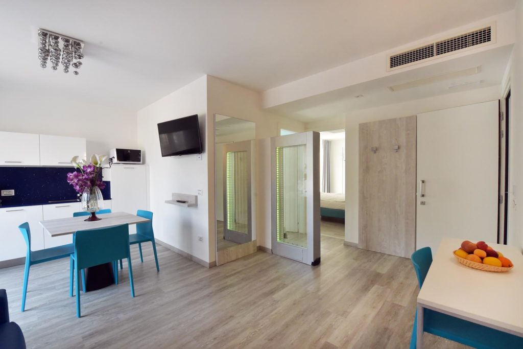EcoHotel Primavera - Appartamento una camera Deluxe - Acqua - zona giorno e cucina