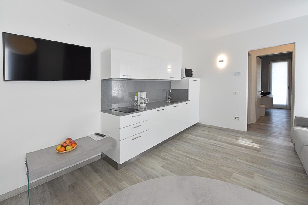 EcoHotel Primavera - Appartamento una camera Deluxe - Luna - zona giorno e cucina