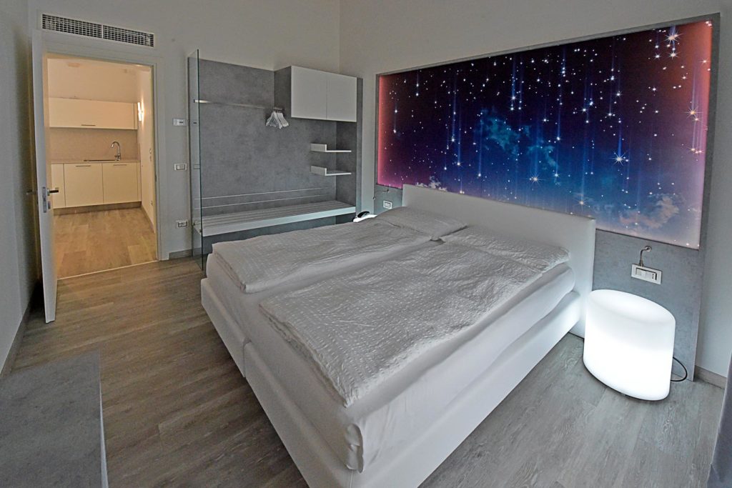 EcoHotel Primavera - Appartamento con due camere Deluxe - Fuoco - camera da letto