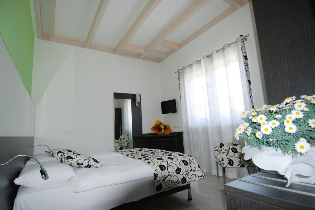 EcoHotel Primavera - Appartamento una camera - camera da letto